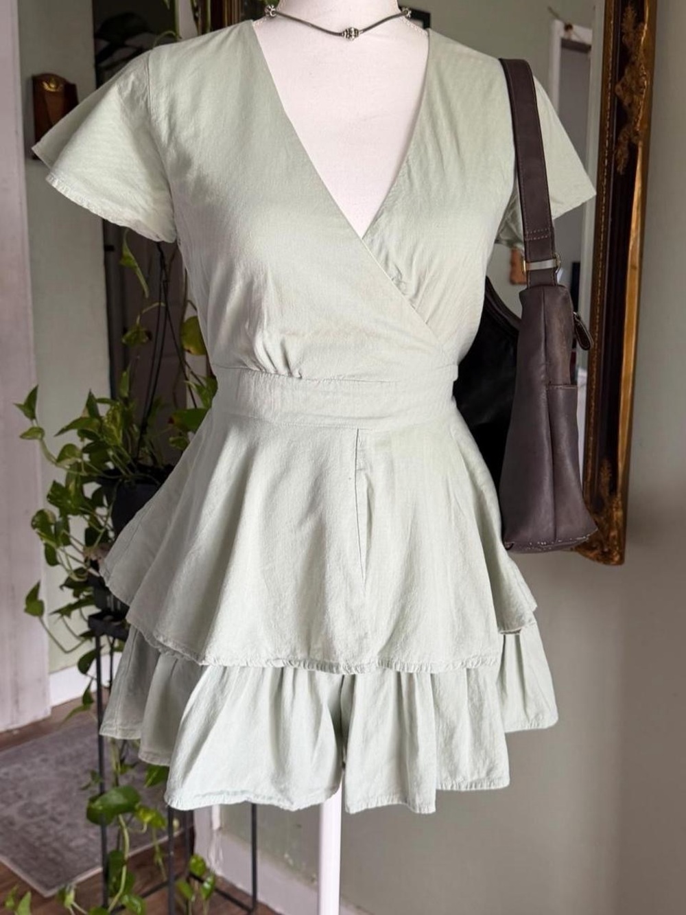 Fairy core green romper with ruffle detail and tie back feature to cinch waist